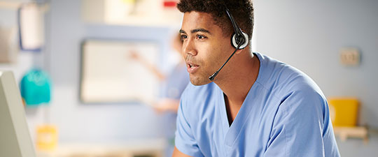 Male nurse on a telemedicine call with patient